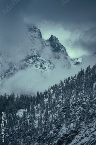 Dramatic dark, mysterious, and moody mountains in the foggy Pacific Northwest
