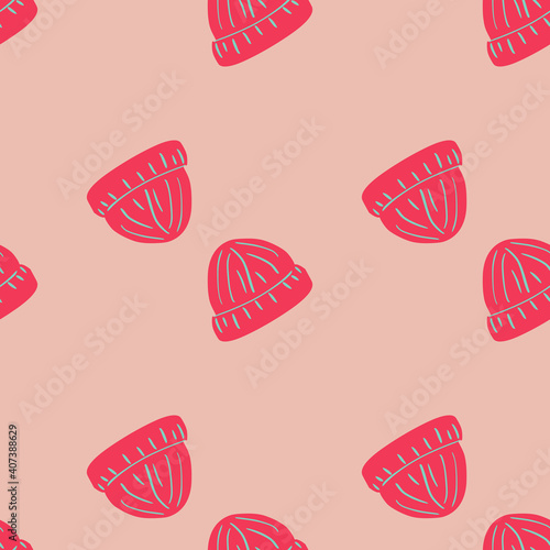 Doodle hipster seamless pattern with bright pink beanie hat silhouettes. Pastel background. Hand drawn print.