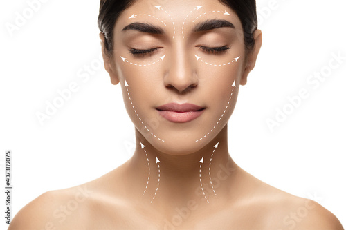 Beautiful female face with lifting up arrows isolated on white background. Concept of bodycare, cosmetics, skincare, correction surgery, beauty and perfect skin. Flyer for your ad. Antiaging.