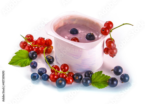 yogurt and currant berries on a white background