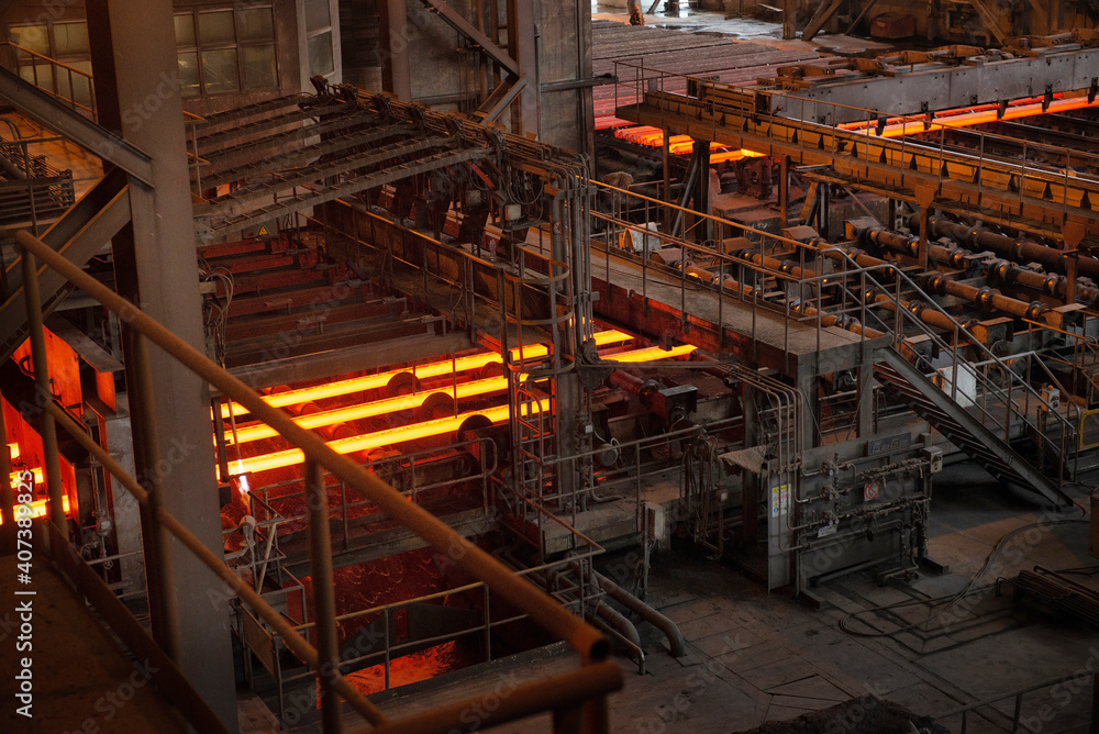 Steel production in electric furnaces. Sparks of molten steel. Electric arc furnace shop . Metallurgical production, heavy industry, engineering, steelmaking