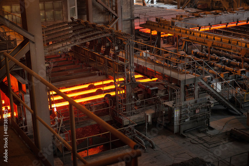 Steel production in electric furnaces. Sparks of molten steel. Electric arc furnace shop . Metallurgical production, heavy industry, engineering, steelmaking