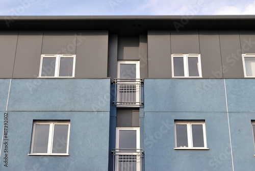 Facade of Modern Apartment Building seen from Below