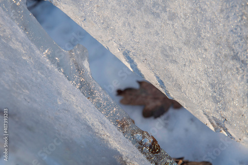 .Close-up pieces of ice texture on the forest in winter time at Bucharest.. photo