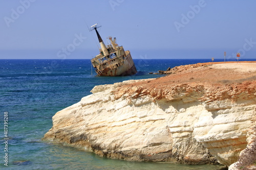 Shipwreck of the abandoned ship Edro III on a rocky coast at Akrotiri Beach in Cyprus