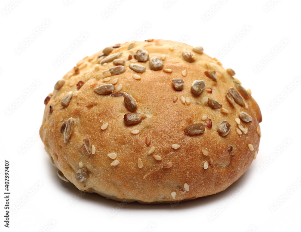 Round bread loaf, bun with mixed seeds isolated on white background Round bread loaf, bun with mixed seeds isolated on white background