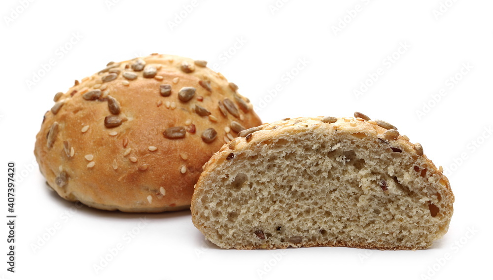 Round bread loafs, buns with mixed seeds and sliced half isolated on white background Round bread loafs, buns with mixed seeds and sliced half isolated on white background