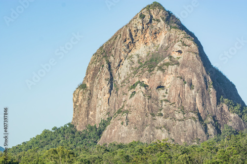 Tibrogargan - one of the dramatic volcanic outcrops that make up the Glasshouse Mountains in Queensland, Australia.