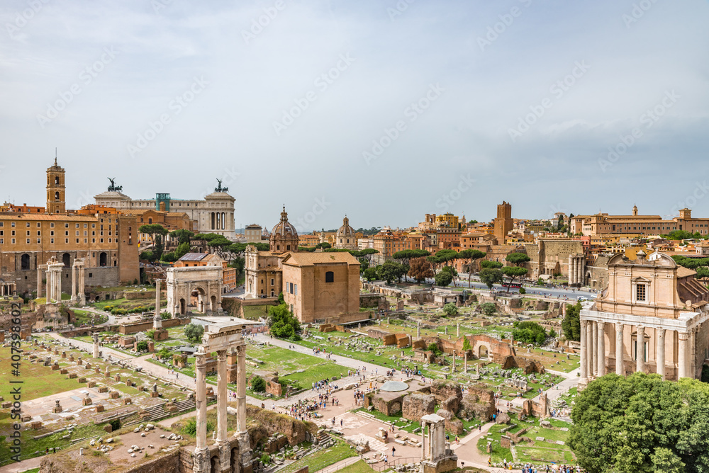 Roman Forum in Rome, Italy, It is one of main tourist attractions of Rome. Nice panorama of the famous old Roman Forum or Foro Romano in summer. Ancient architecture and cityscape of historical Rome.