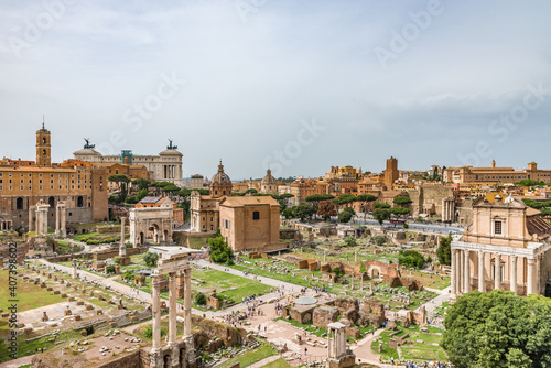 Roman Forum in Rome, Italy, It is one of main tourist attractions of Rome. Nice panorama of the famous old Roman Forum or Foro Romano in summer. Ancient architecture and cityscape of historical Rome.