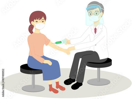 予防接種を受ける女性と医師（マスクとフェイスシールド）／Vaccinated women and doctors (masks and face shields)