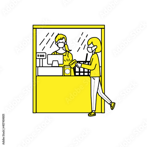 カードで決済するマスク女性