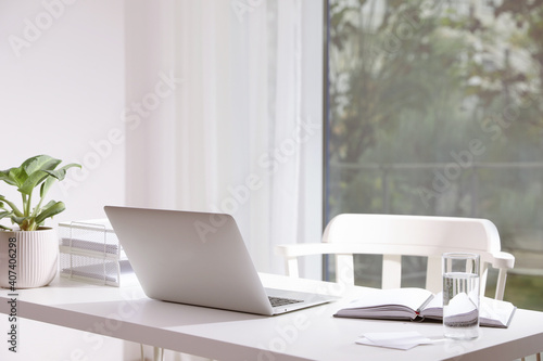 Wallpaper Mural Comfortable workplace with modern laptop in office Torontodigital.ca