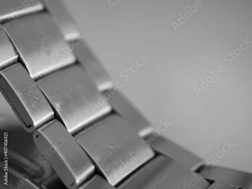Abstract blurred photo of, Watch strap stainless still on blurred background with copy space.