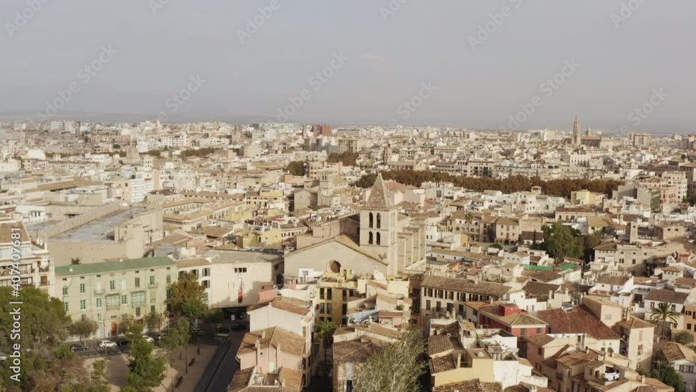 Architecture of the old European city dron 4K video. Aerial view of the historic city center with churches streets, houses with red roofs in Palma Spain. Architecture of the old European city dron 4K video. Aerial view of the historic city center with churches streets, houses with red roofs in Palma Spain.