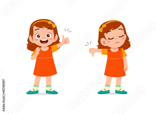 little girl show hand gesture thumb up and thumb down