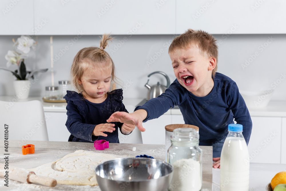 Crying and dirty children in the kitchen. Self-catering.