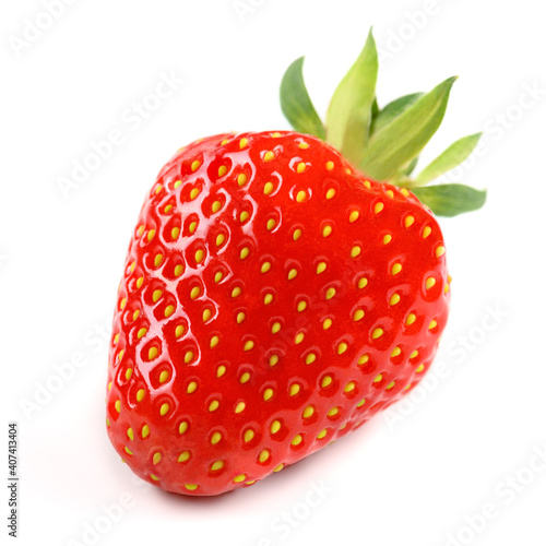 sweet ripe red strawberries with green leaves on a white isolated background close up