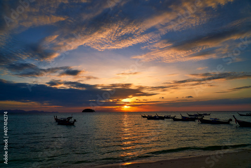 New day with Sunrise Skyline and Silhouette boats in the sea for landscape travel