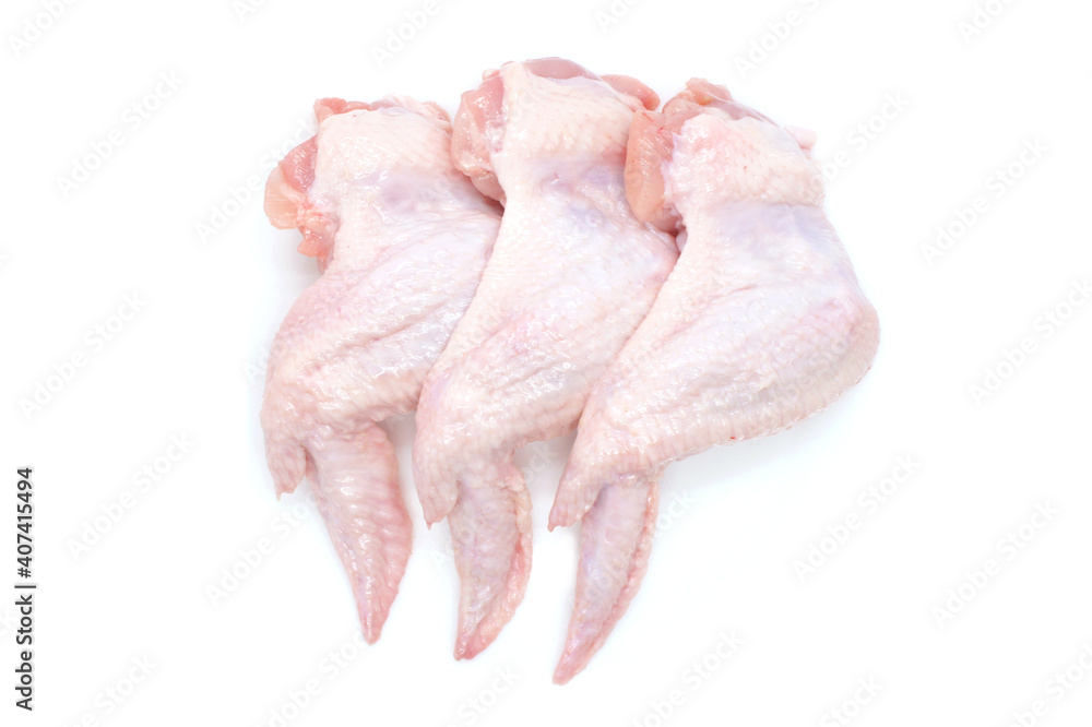 Raw Chicken wings isolated on white background. Three fresh chicken wings for cooking. Close-up. Top view. Raw Chicken wings isolated on white background. Three fresh chicken wings for cooking. Close-up. Top view.