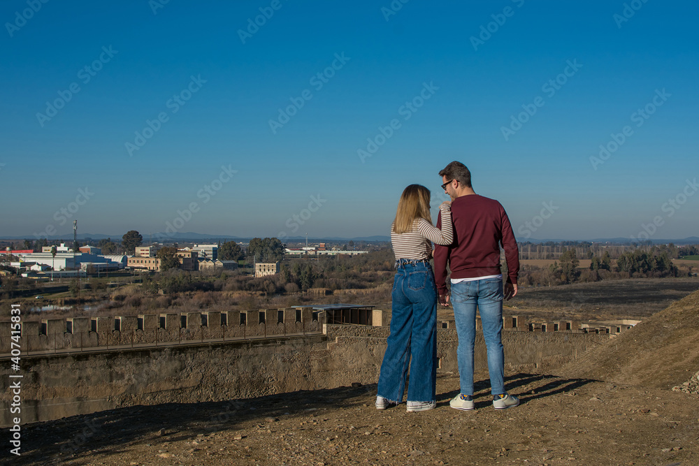 Couple In Love Looking At The Landscape.
