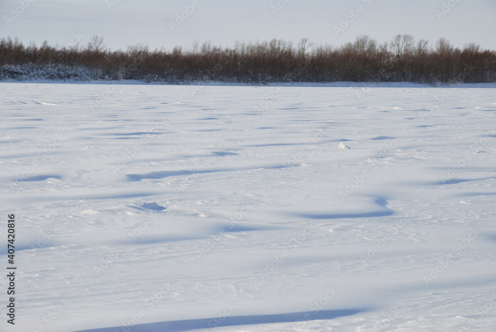 Snow cover on the bank of the Irtysh River Snow cover on the bank of the Irtysh River
