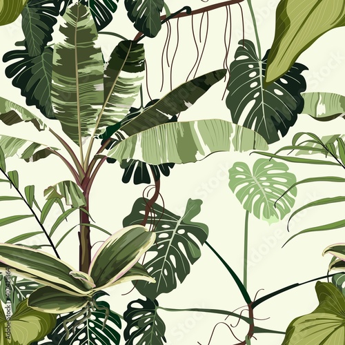 Tropical pattern, palm tree leaves and exotic plant  seamless border on light vintage background. Exotic jungle wallpaper.