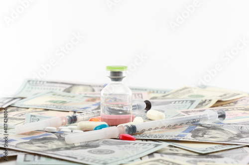 Мoney, pills and syringes
