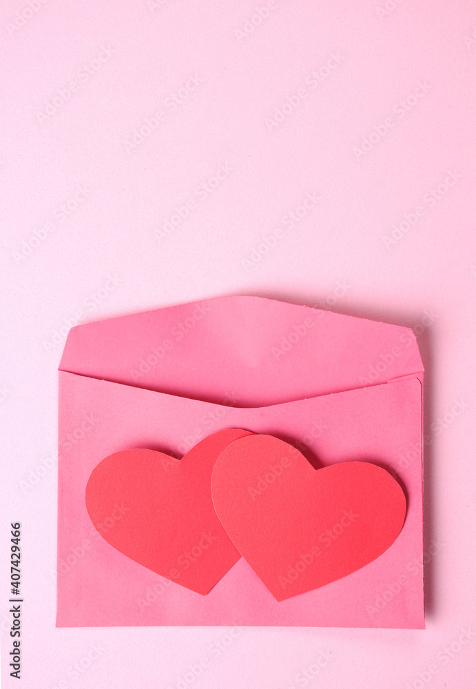 pink envelope with two paper hearts pink envelope with two paper hearts