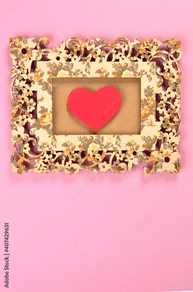 flowery frame with red heart in the center with space for text
