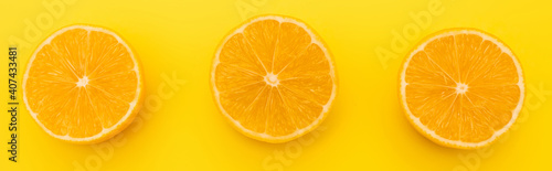 top view of juicy lemons halves isolated on yellow  banner