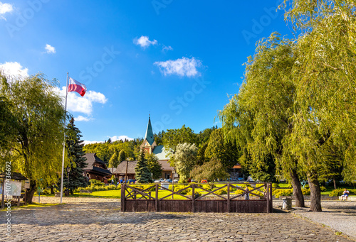 Fototapeta Naklejka Na Ścianę i Meble -  Panoramic view of central market square of historic royal open-air museum town of Lanckorona in mountain region of Lesser Poland