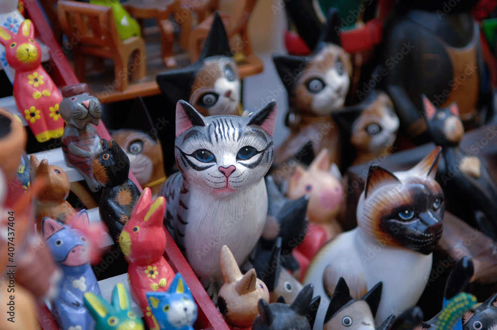 Cat dolls are displayed at the stalls.