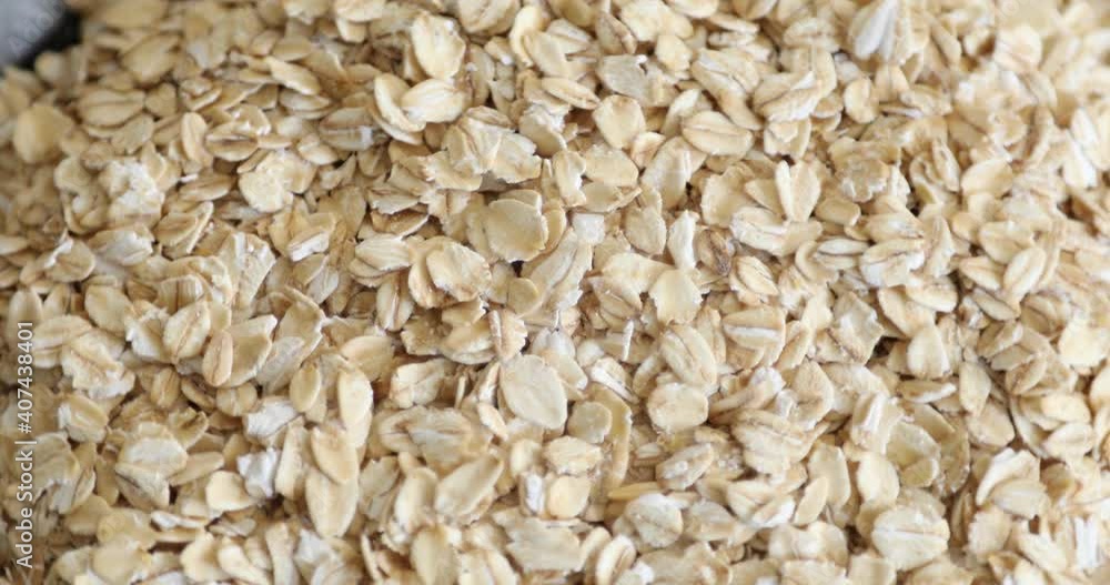 Top view of dry raw oat flakes Top view of dry raw oat flakes