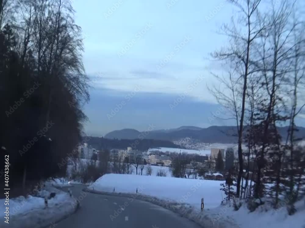 Driving car through winter forest road Driving car through winter forest road