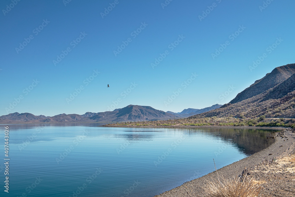 Sea of Cortes, under a deep blue sky surrounded by mountains at Bahia Concepcion, by the Baja peninsula in the state of Baja California Sur. MEXICO