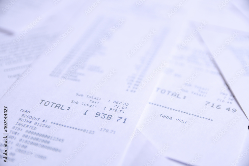 Background from checks from purchases from shops. Close up Background from checks from purchases from shops. Close up