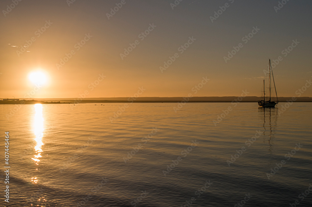 Boat in the sea of cortes, in La Paz Baja California Sur sunset on the beach, seascape photography