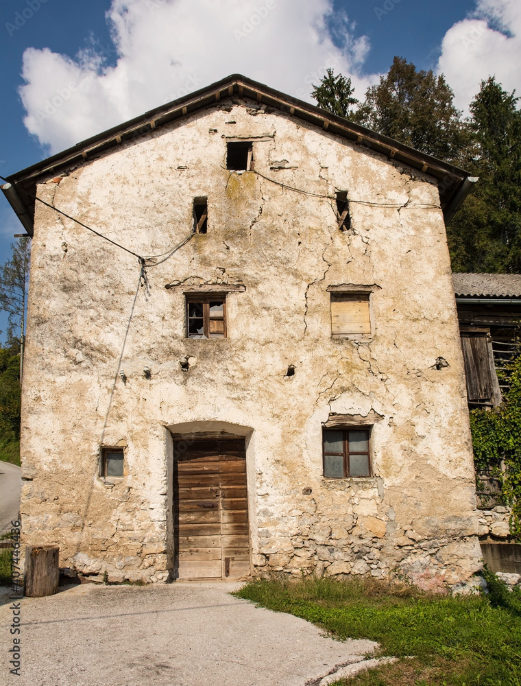 Old abandoned farm building in Zadlaz-Cadrg near Zatolmin in the Tolmin district of the Slovenian Littoral or Primorska region of western Slovenia
