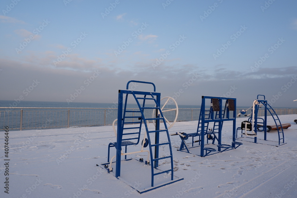 Outdoor sports ground on the shores of the Baltic Sea in winter. Copy space for text. Outdoor sports ground on the shores of the Baltic Sea in winter. Copy space for text.