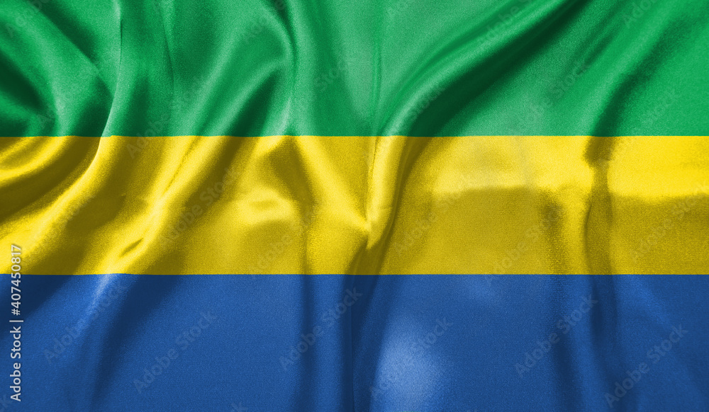 Gabon flag wave close up. Full page Gabon flying flag. Highly detailed realistic 3D rendering Gabon flag wave close up. Full page Gabon flying flag. Highly detailed realistic 3D rendering