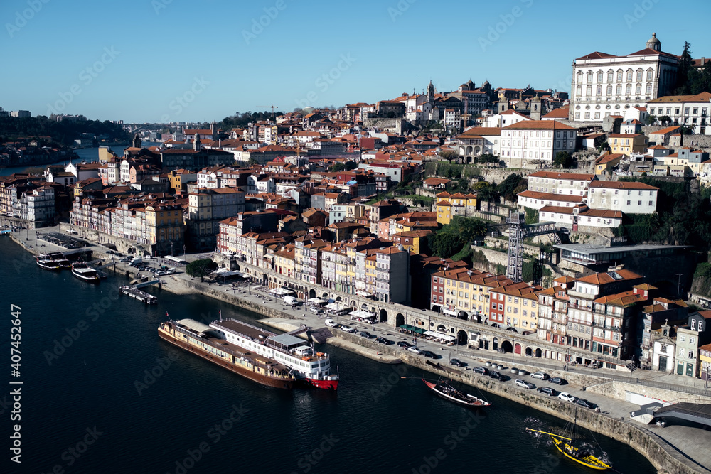 Top view of Ribeira and Douro river from the Don Luis I Bridge in Porto, Portugal.