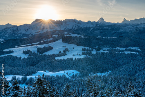 winter sunrise over the hills of Emmental and Bernese Alps