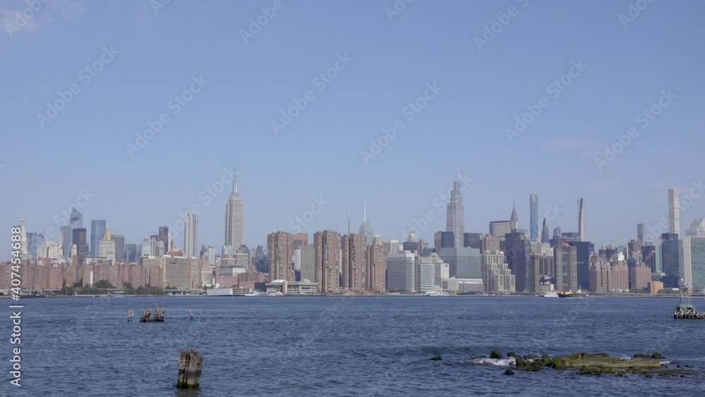 View of midtown Manhattan in New York from across the east river from Bushwick inlet park in Brooklyn. View of midtown Manhattan in New York from across the east river from Bushwick inlet park in Brooklyn.