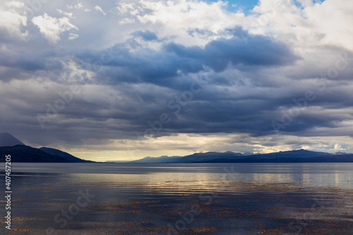 View over the Beagle Channel from Ushuaia towards the Chilean Coast. The sky look menacing and a storm is coming in.