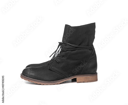 Black female winter boots isolated on a white background.