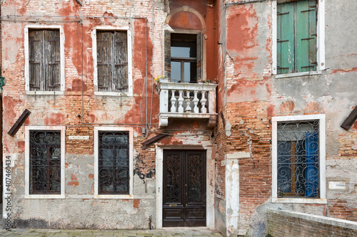 Weathered facade of a typical Venetian residential home  Venice  Italy