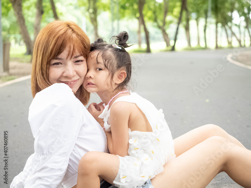 Outdoor nature park green public road holiday family parent mather baby child kid portrait hug cuddle fold look at camera love hope picnic lifestyle happy valentine business romance wedding together