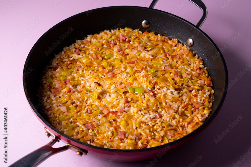Traditional paella with vegetables and iberico ham Traditional paella with vegetables and iberico ham