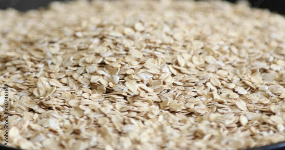 Top view of dry raw oat flakes Top view of dry raw oat flakes